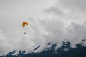 Paragliding through Interlaken in Switzerland