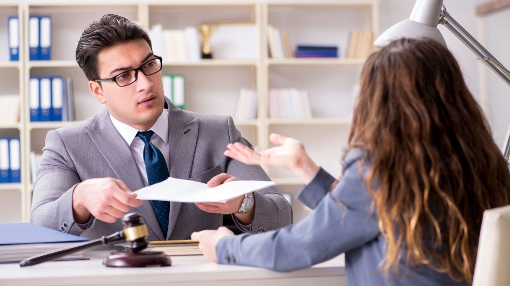 Client discussing her Divorce case with lawyer