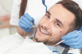 Photo of How can men correct their smiles through dental treatment?